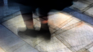 A person's feet in the street